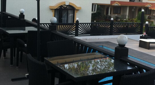 SmallerPoolDiningArea SmallerPoolDiningArea